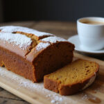 Delicious Pumpkin Spice Loaf Cake slices served with coffee.